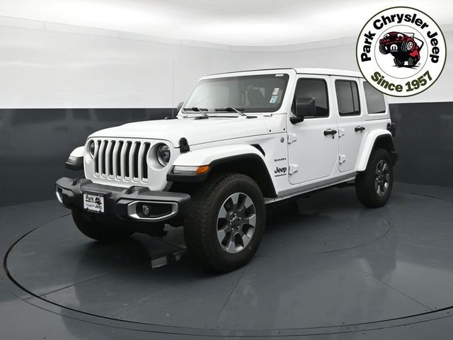 Used 2023 Jeep Wrangler 4-Door Sahara with VIN 1C4HJXEG9PW634154 for sale in Burnsville, Minnesota