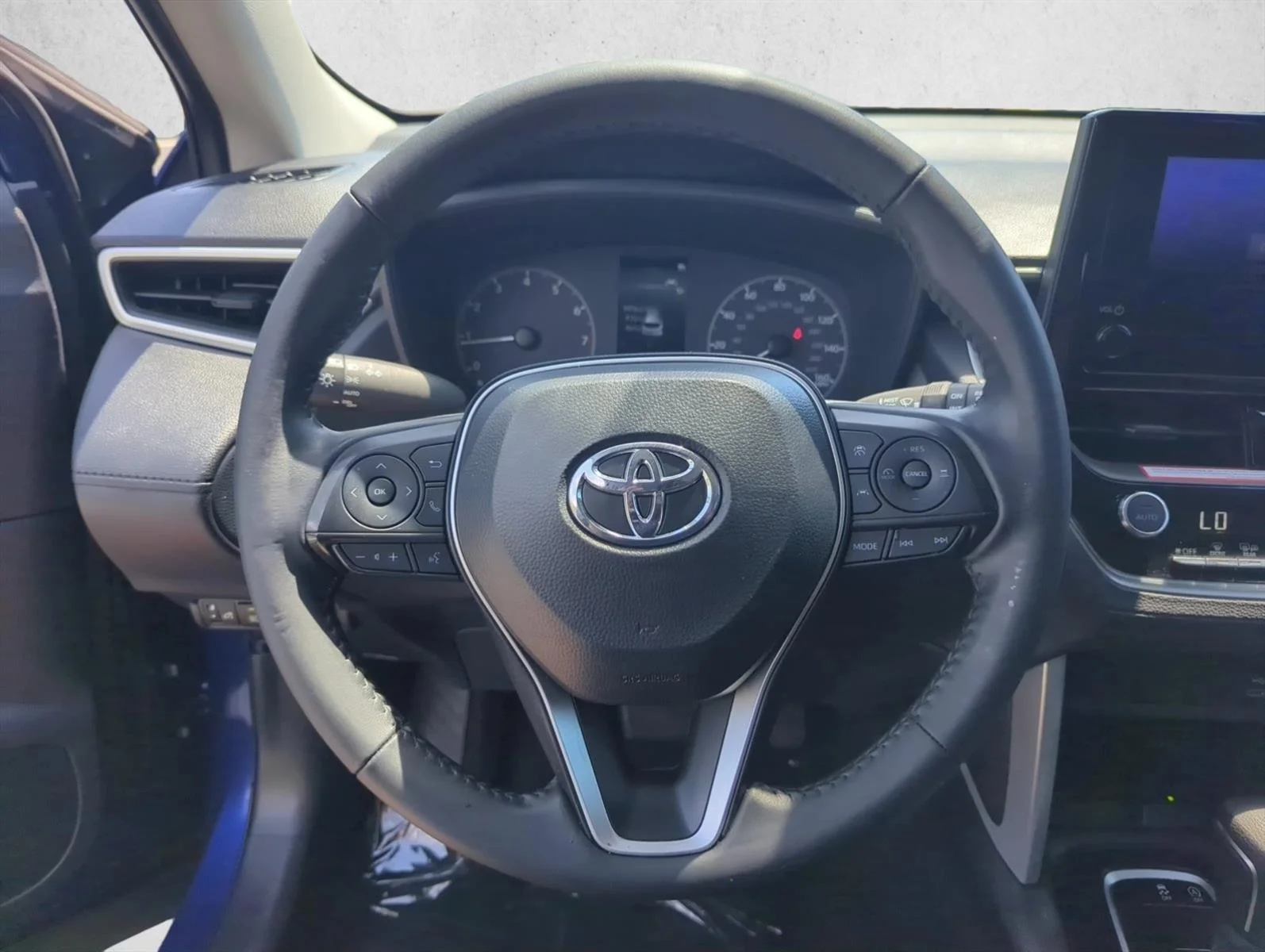 Used 2024 Blue Crush Metallic Toyota LE image 11