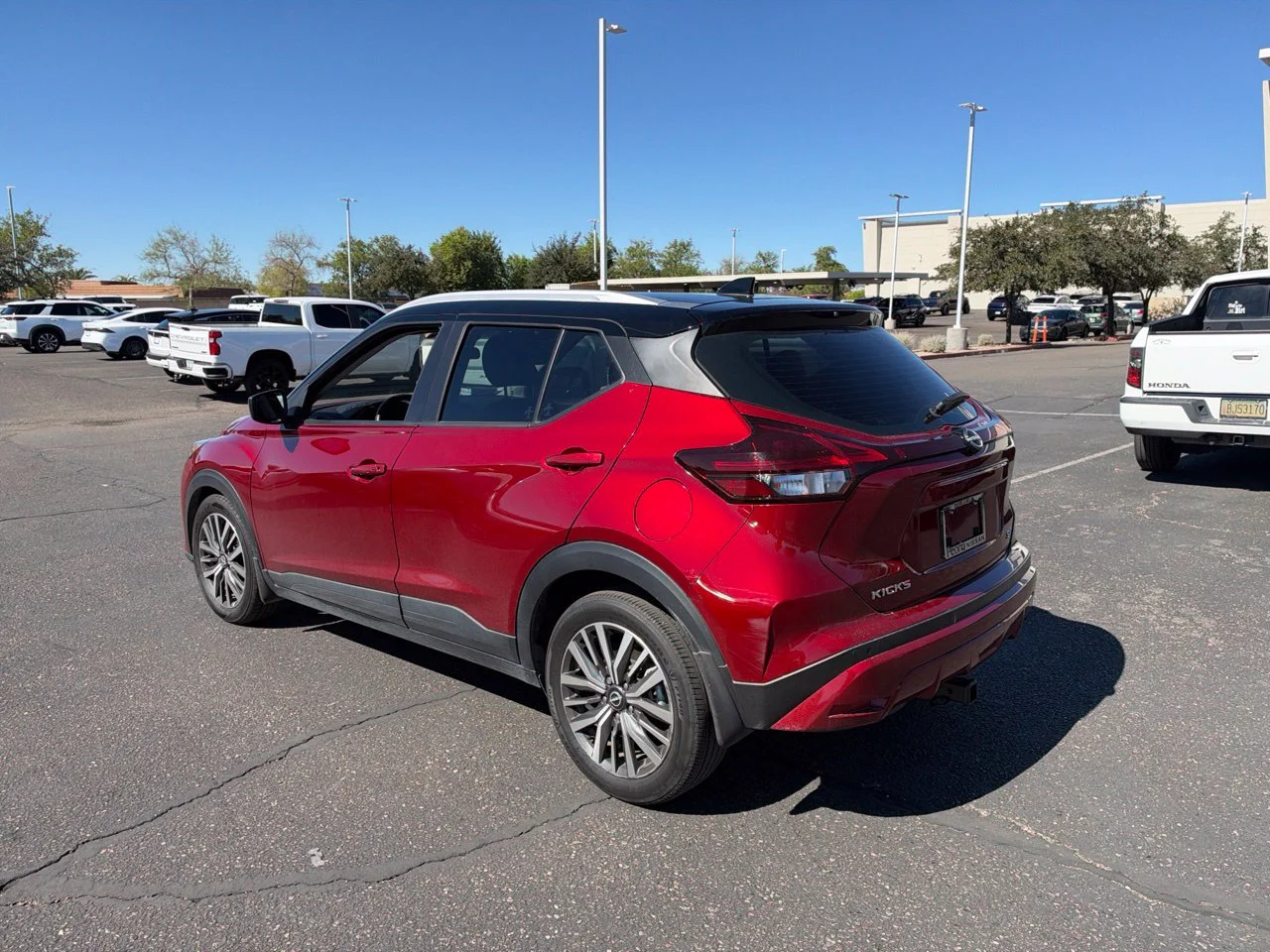 Used 2023 Scarlet Ember Tintcoat Super Black Nissan SV image 6