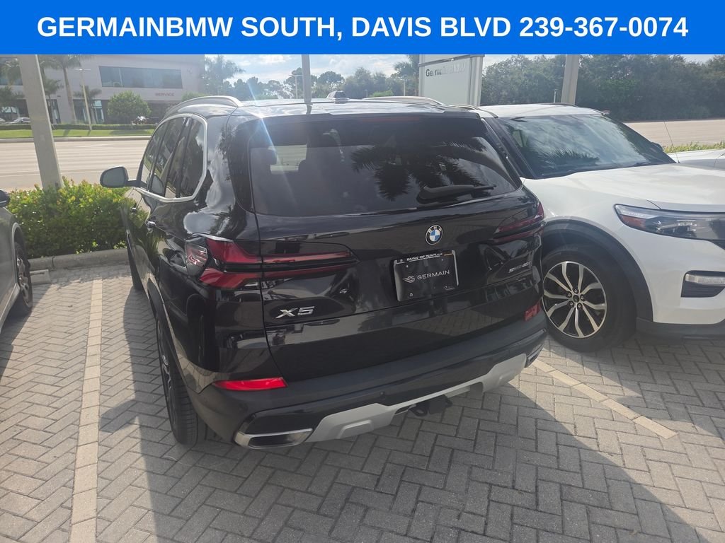 Certified Used 2024 Black Sapphire Metallic BMW sDrive40i image 8