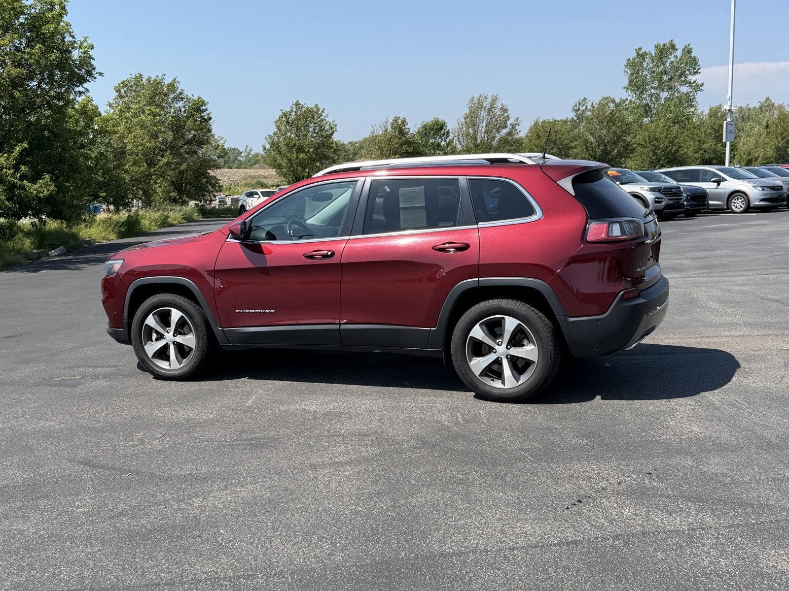 Used 2021 Velvet Red Pearlcoat Jeep Limited image 7