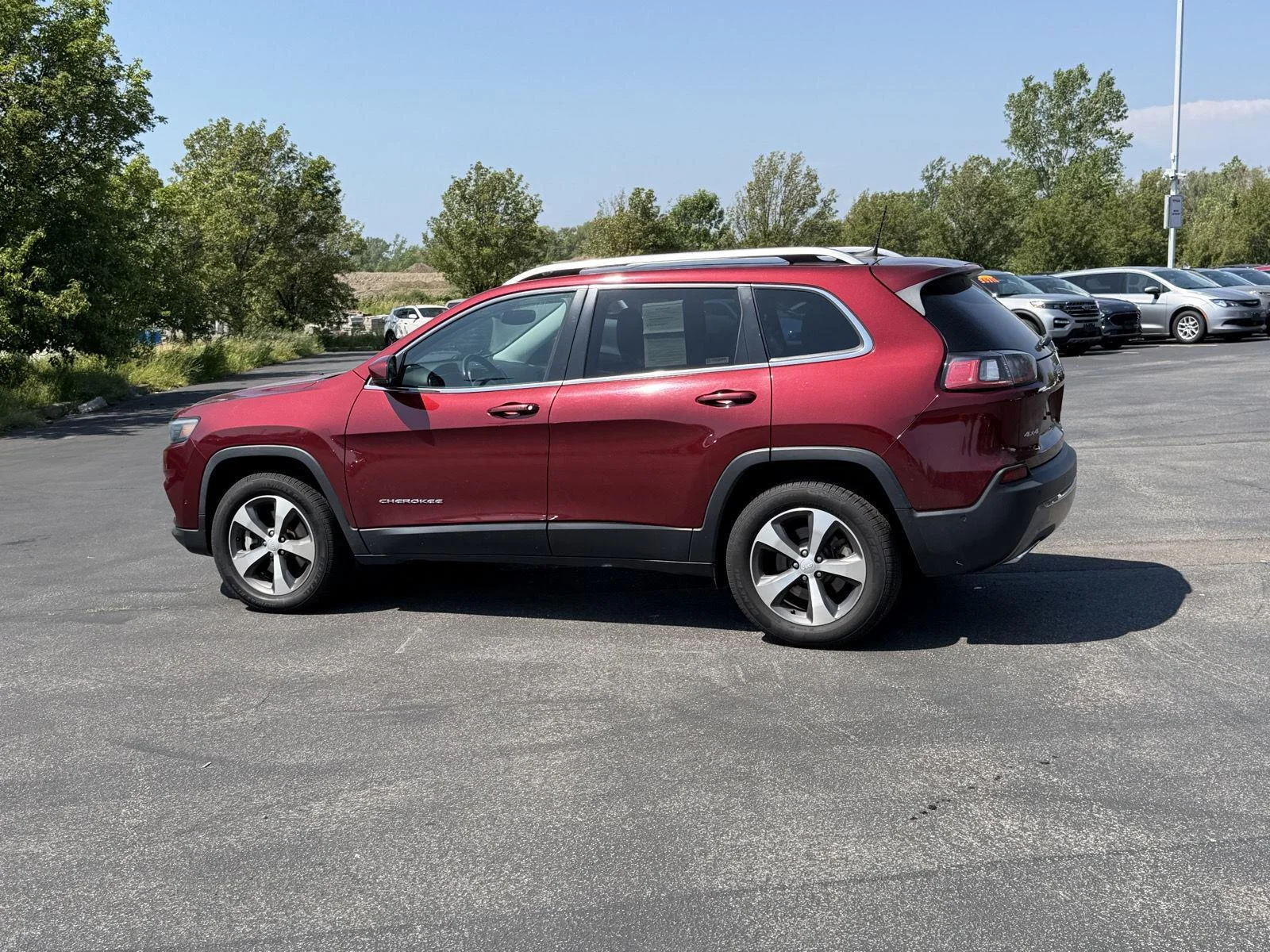 Used 2021 Velvet Red Pearlcoat Jeep Limited image 7