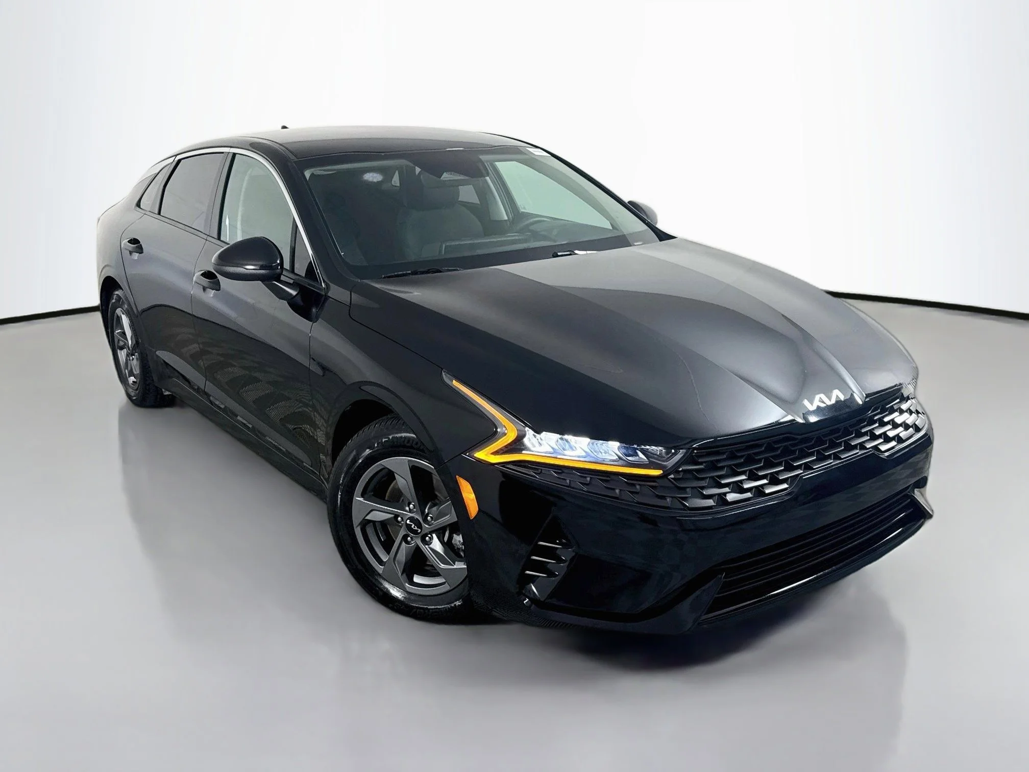 Used 2022 Ebony Black Kia LX image 1