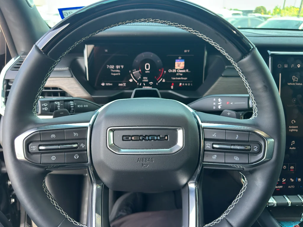 Used 2024 Ebony Twilight Metallic GMC AWD Denali image 11