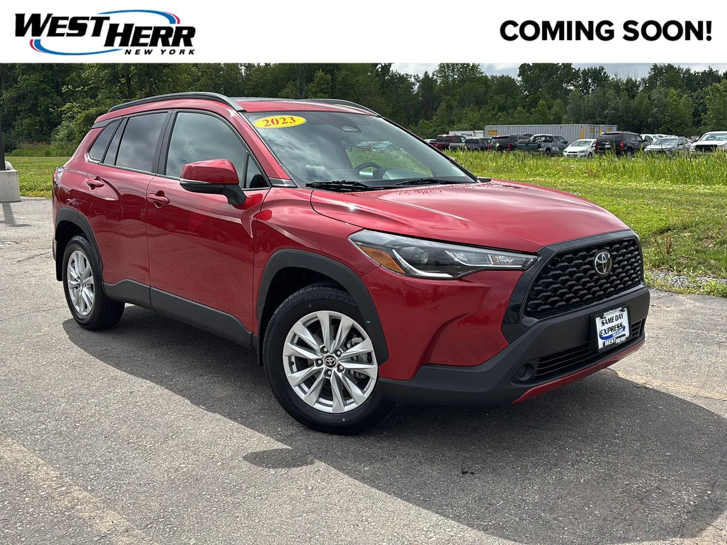 Used 2023 Barcelona Red Metallic Toyota LE image 1