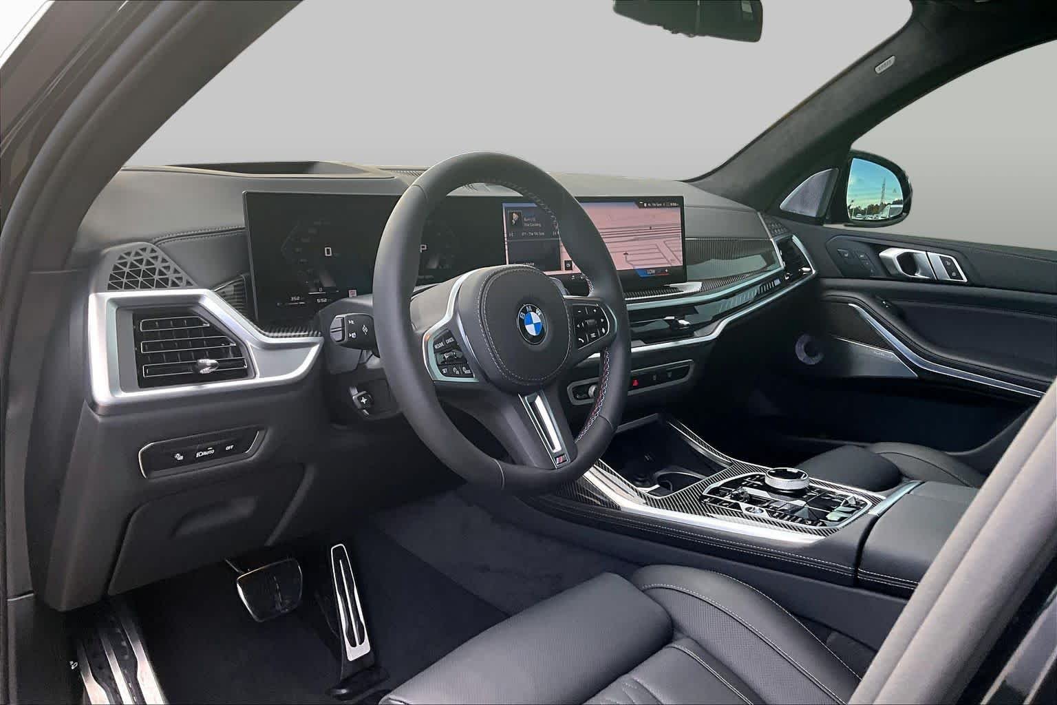 Used 2026 Black Sapphire Metallic BMW M60i image 16
