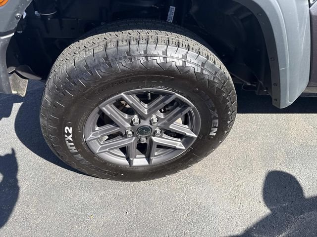 Used 2025 Granite Crystal Clearcoat Metallic Jeep Sport S image 13