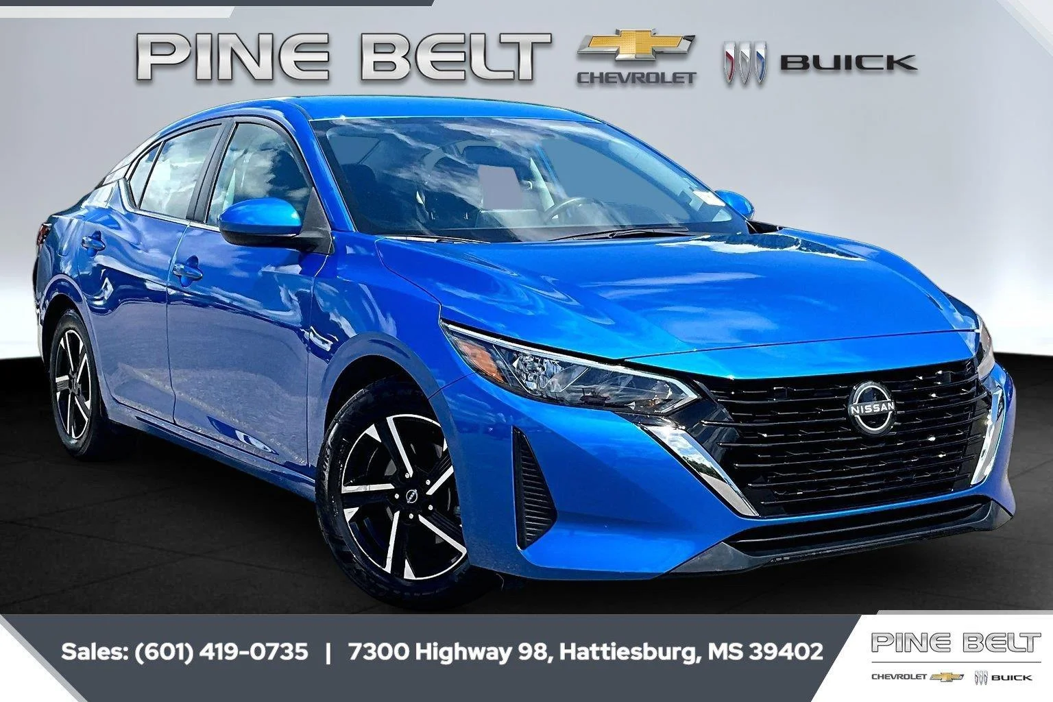 Used 2024 Electric Blue Metallic Nissan SV image 1