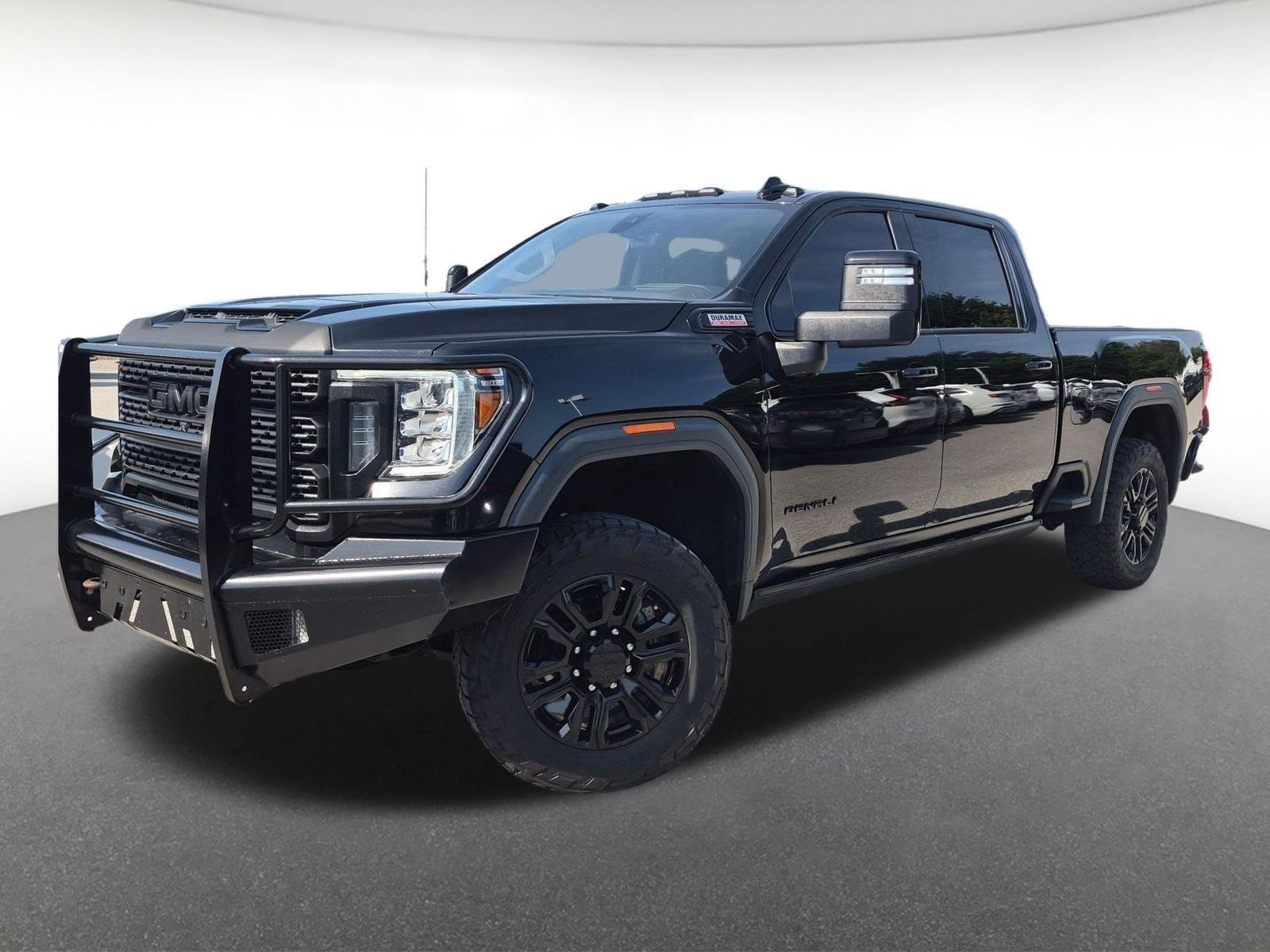 Used 2021 Ebony Twilight Metallic GMC Denali image 1