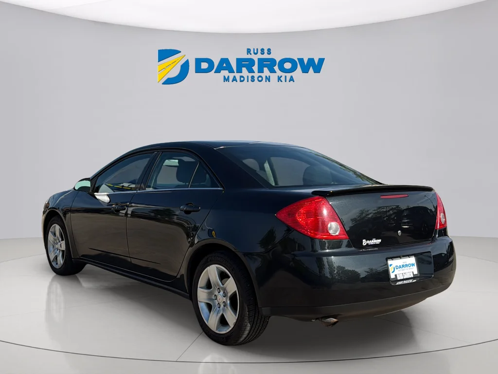 Used 2009 Carbon Black Metallic Pontiac Base image 3