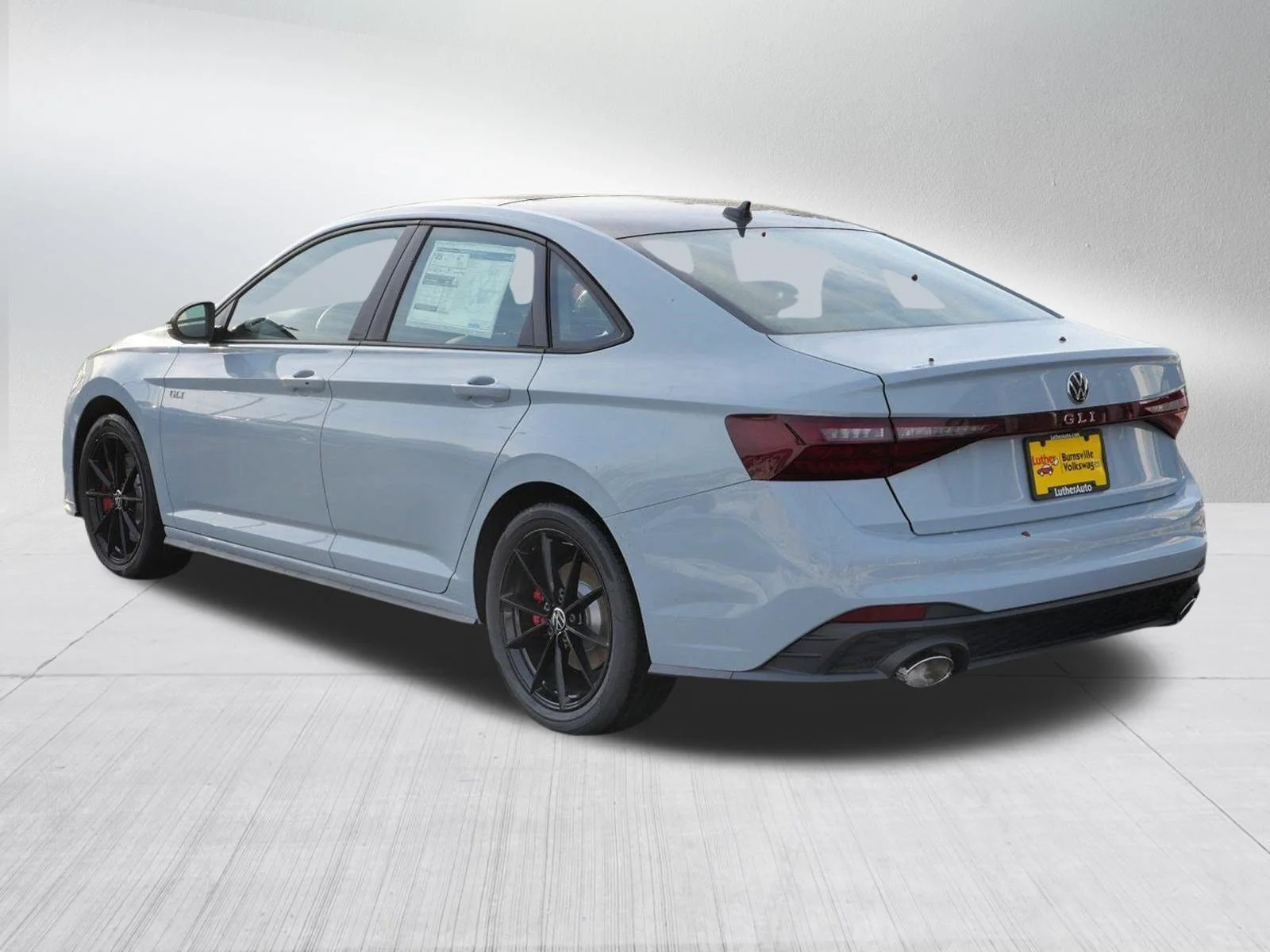 New 2026 Monument Gray w/Deep Black Roof Volkswagen Autobahn image 3