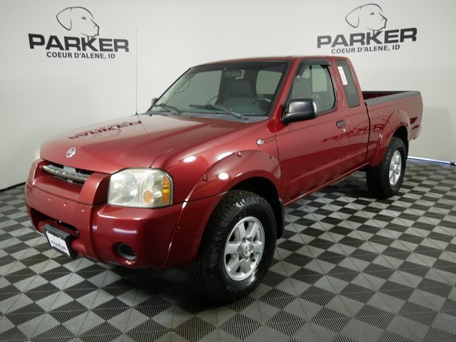 Used 2004 Red Brawn Metallic Nissan Extended Cab SVE image 1