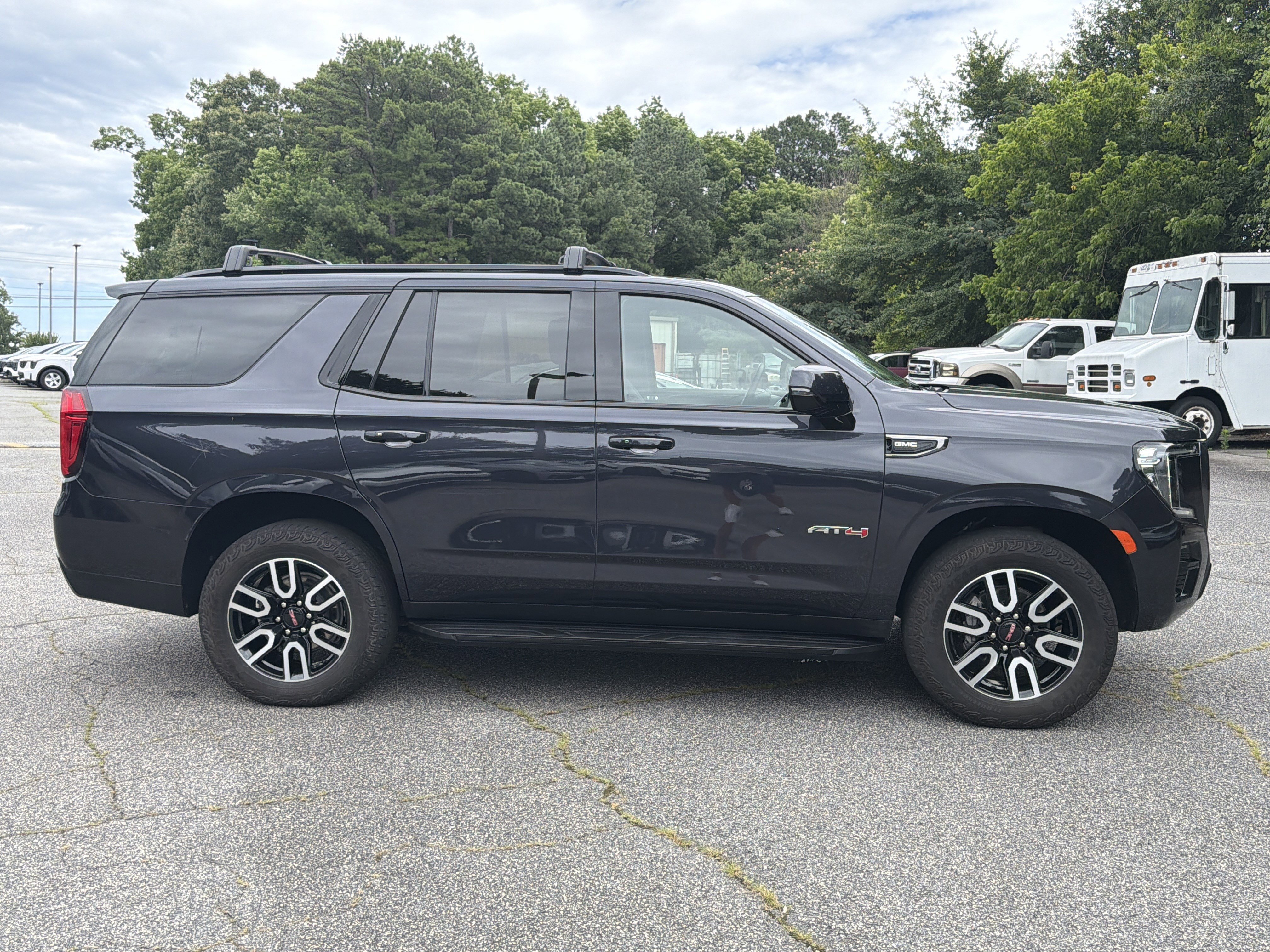 Used 2024 Titanium Rush Metallic GMC AT4 image 8