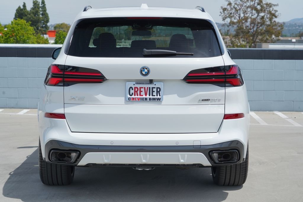 New 2026 Alpine White BMW xDrive50e image 7
