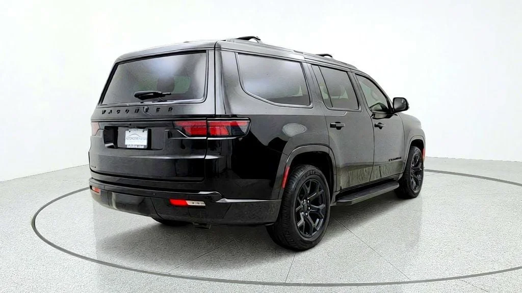 Used 2023 Diamond Black Crystal Pearlcoat Jeep Series II Carbide 4x4 w/ Tri-Pane Roof & Captain