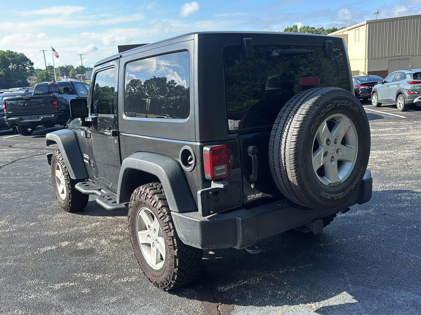 Used 2016 Black Clearcoat Jeep Sport image 5