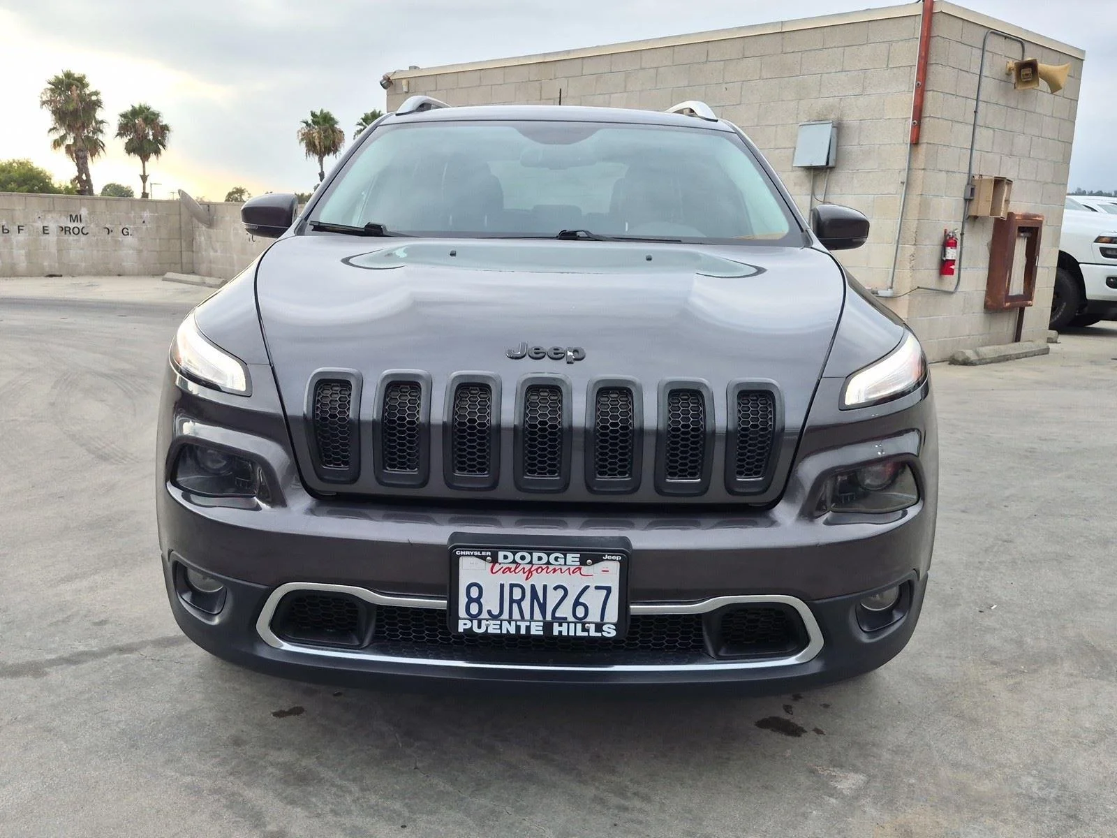 Used 2016 Granite Crystal Metallic Clearcoat Jeep Limited image 2