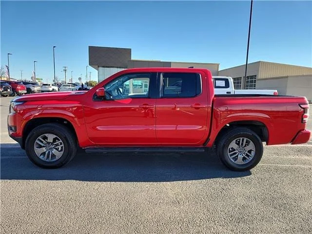 Used 2025 Red Alert Nissan SV 4x4 Crew Cab 5 ft. box 126 in. WB image 2