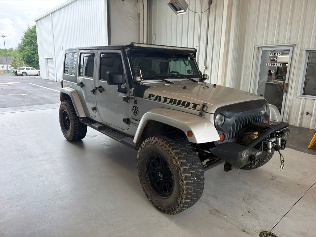 Used 2012 Bright Silver Metallic Clearcoat Jeep Sahara image 2