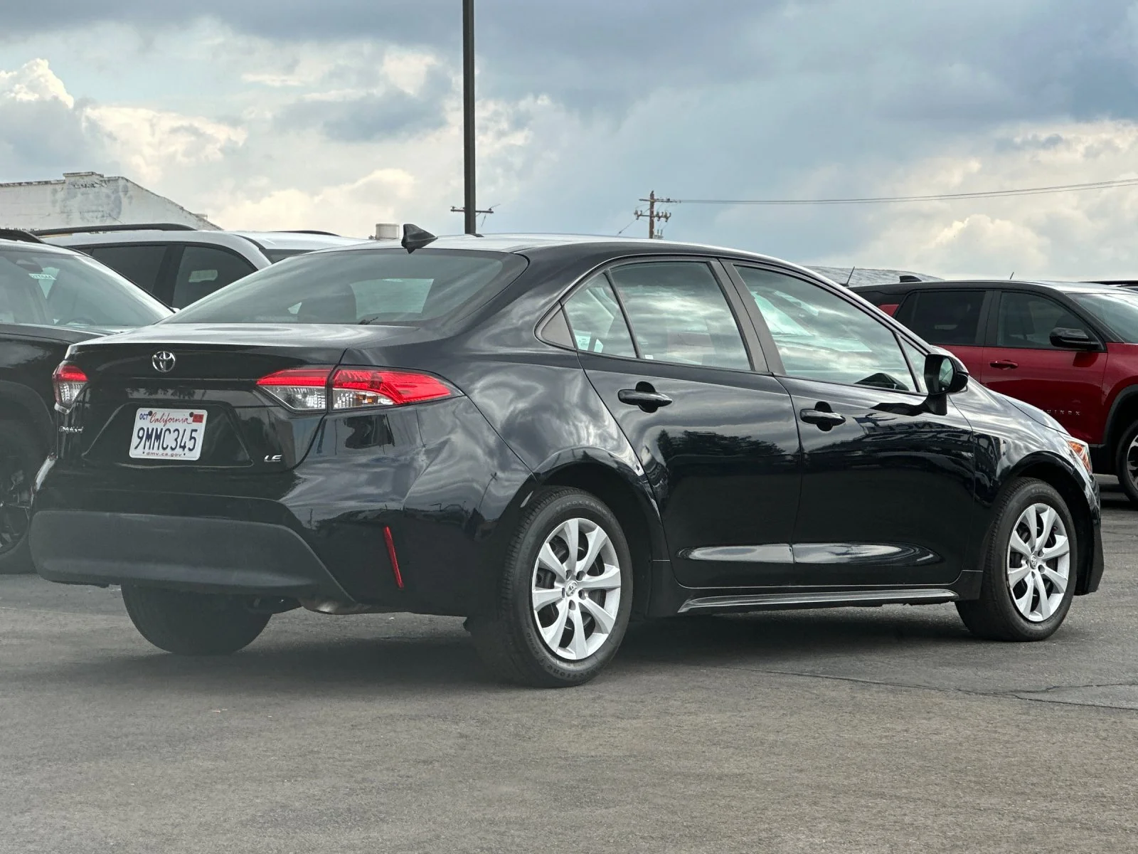 Used 2024 Black Toyota LE image 4