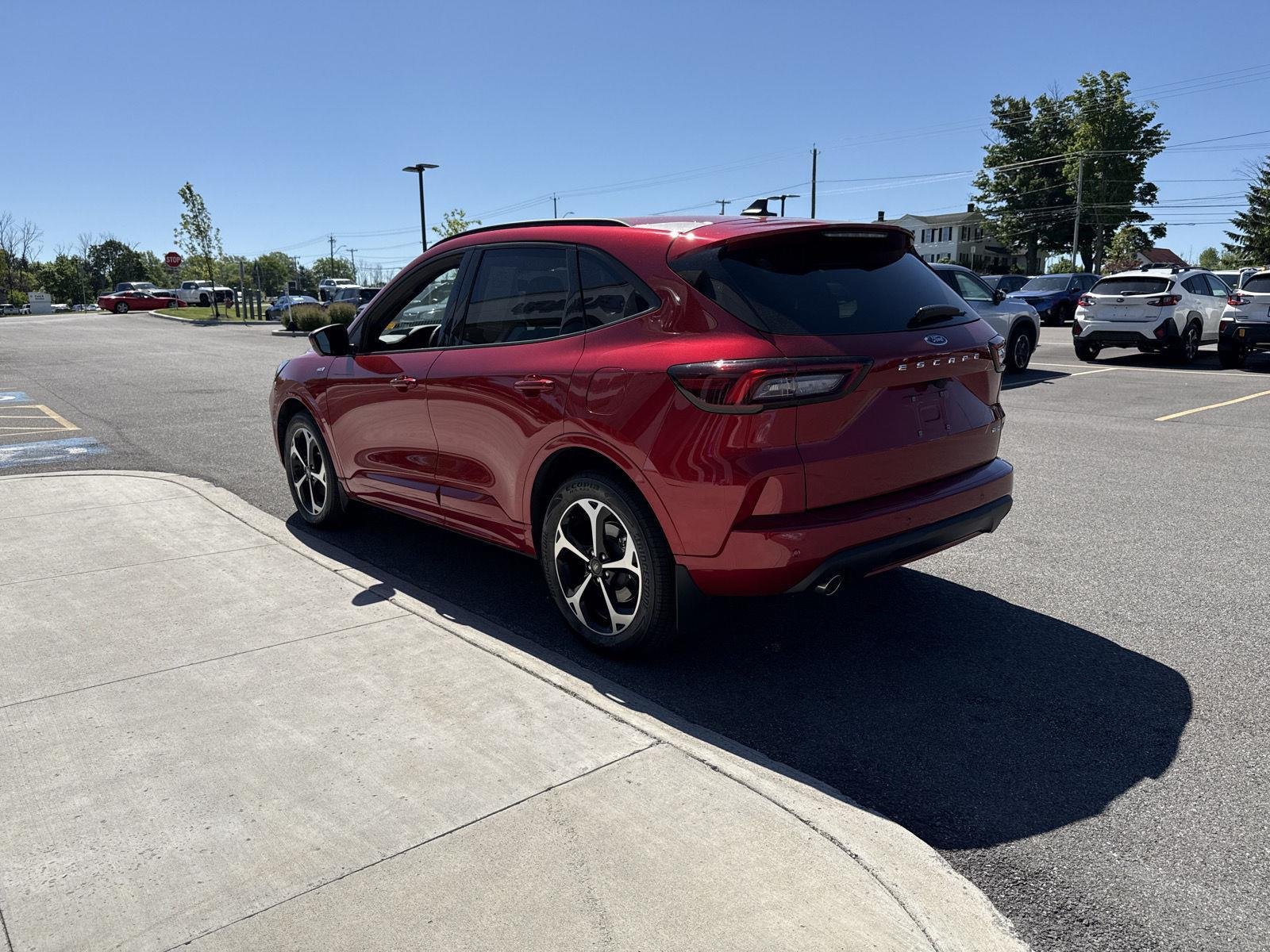 Used 2024 Rapid Red Metallic Tinted Clearcoat Ford ST-Line Elite image 5