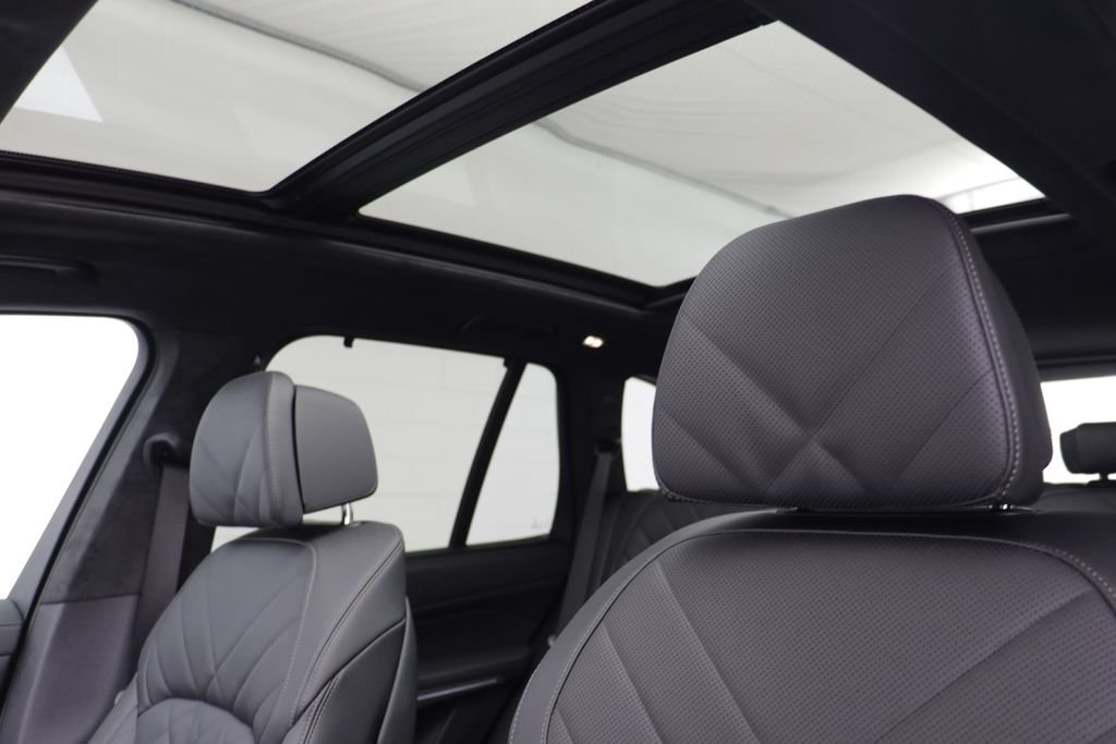 New 2026 Black Sapphire Metallic BMW xDrive50e image 13