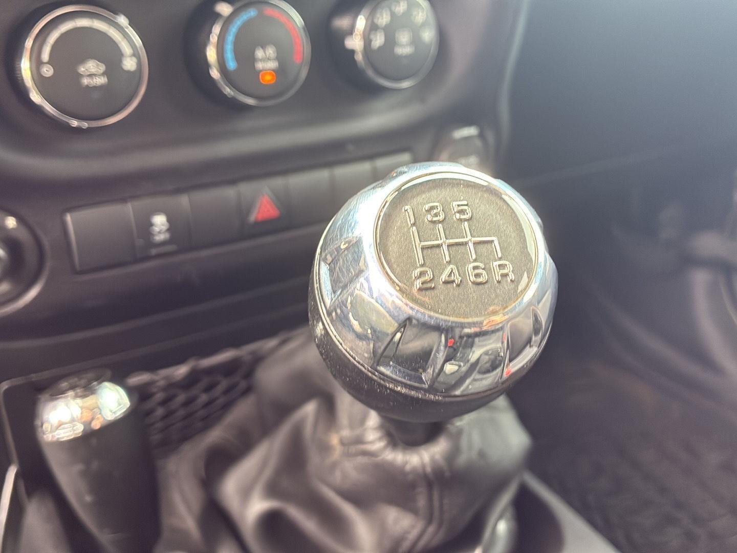 Used 2016 Black Clearcoat Jeep Sport image 4