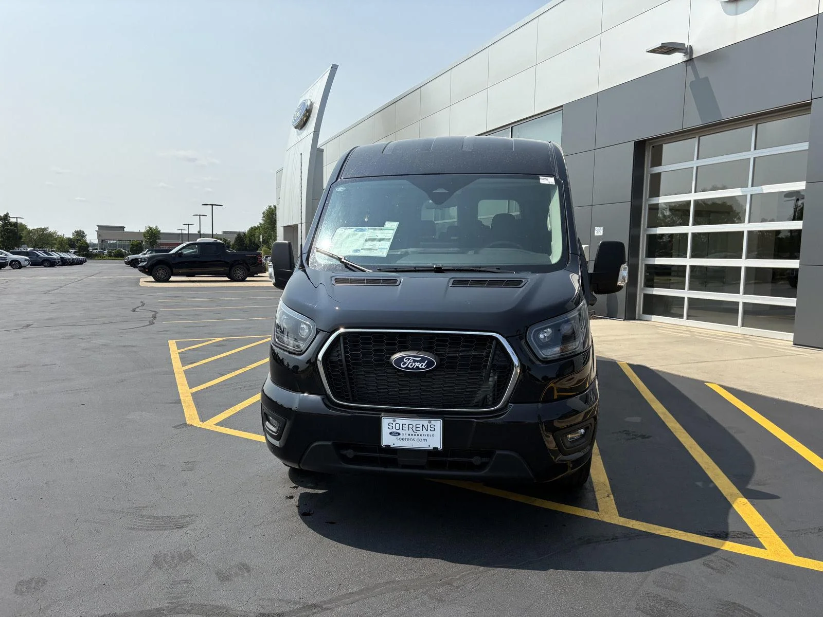 New 2026 Agate Black Metallic Ford Passenger Van XLT image 2