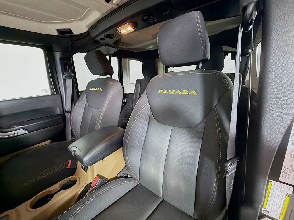 Used 2015 Black Jeep Unlimited Sahara image 11