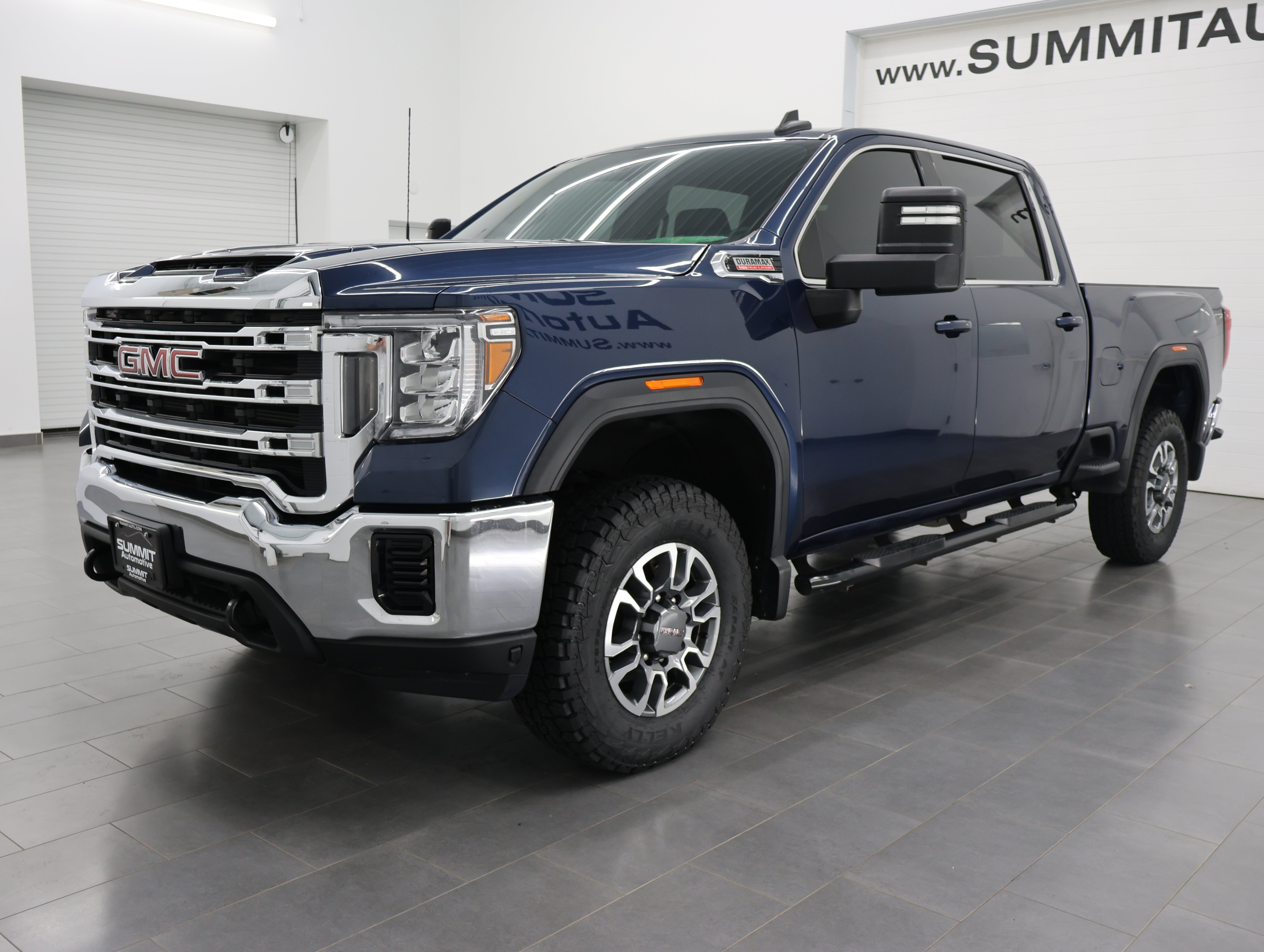 Used 2023 Pacific Blue Metallic GMC 4x4 Crew Cab SLE: CREW-SHORT-SLE-6.6L DIESEL-4WD-NEW TIRES-BACKUP CAM image 7