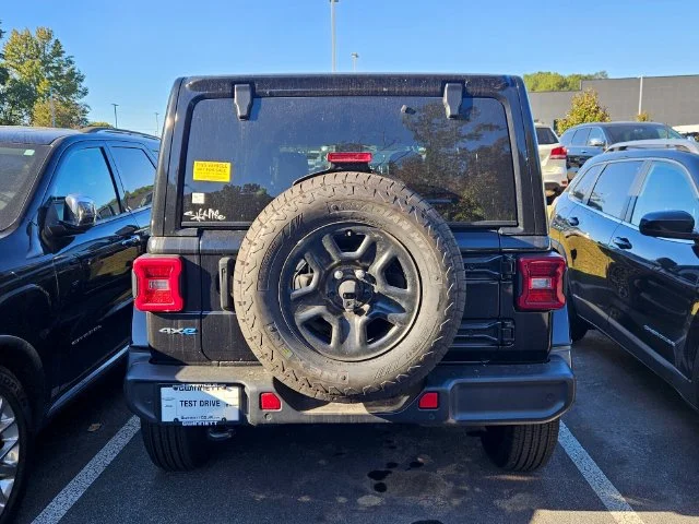 Used 2021 Black Jeep Unlimited Sahara 4xe image 4
