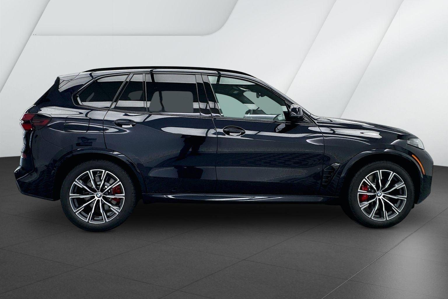 New 2026 Carbon Black Metallic BMW xDrive50e image 5