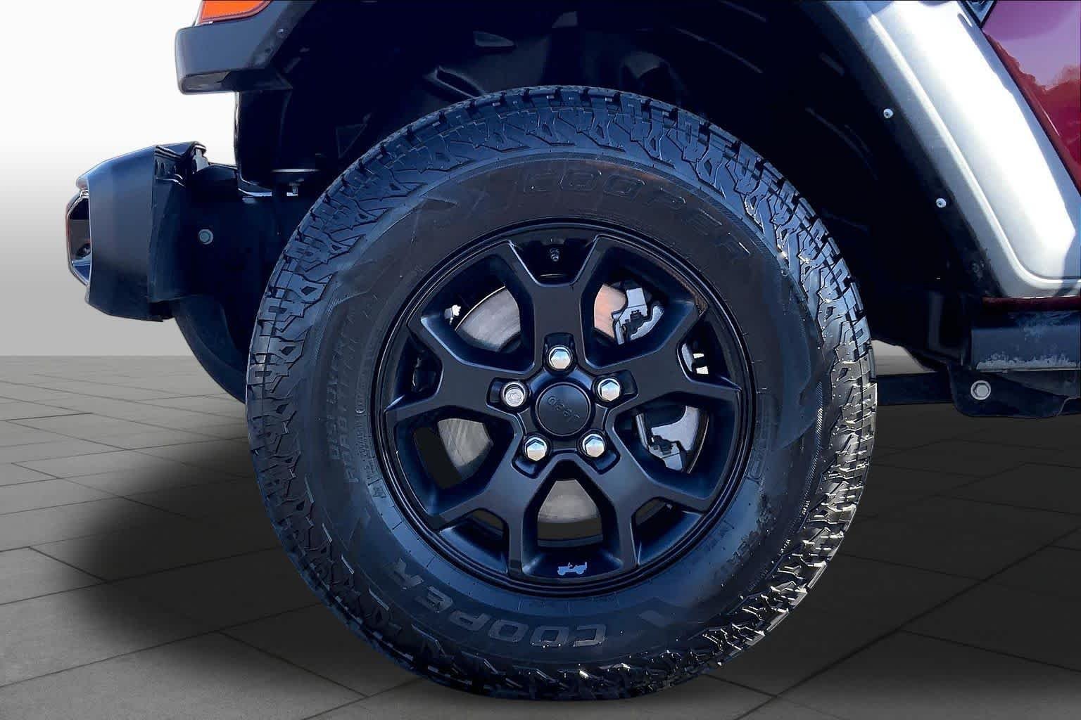 Used 2021 Snazzberry Pearlcoat Jeep Unlimited Willys Sport image 11