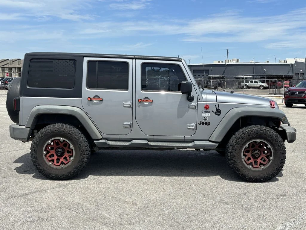 Used 2013 Jeep Wrangler Unlimited Sport with VIN 1C4BJWDG5DL680580 for sale in Brunswick, GA