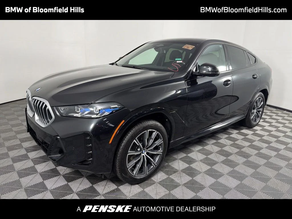 Used 2024 Black Sapphire Metallic BMW xDrive40i image 1