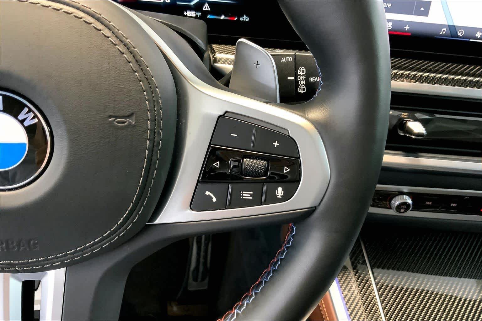 Certified Used 2026 Carbon Black Metallic BMW M60i image 24