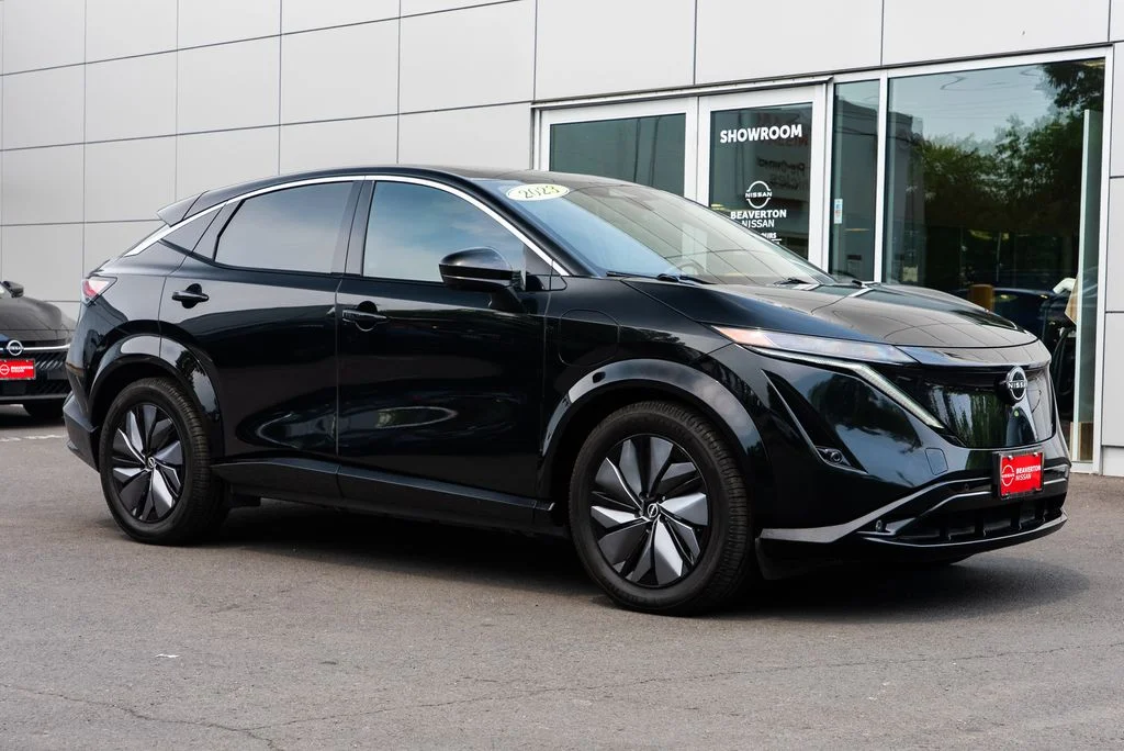 Used 2023 Black Nissan EVOLVE+ image 1