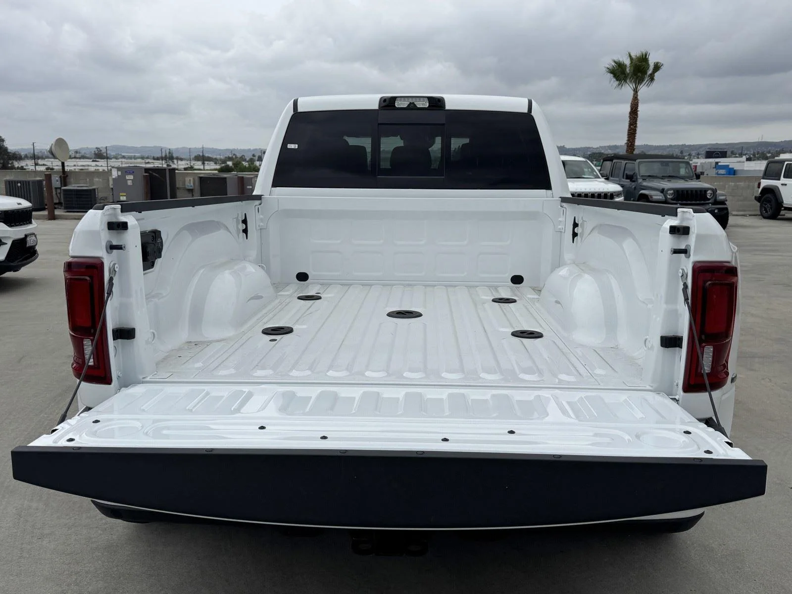 New 2026 Bright White Clear-Coat Exterior Paint RAM Laramie image 12