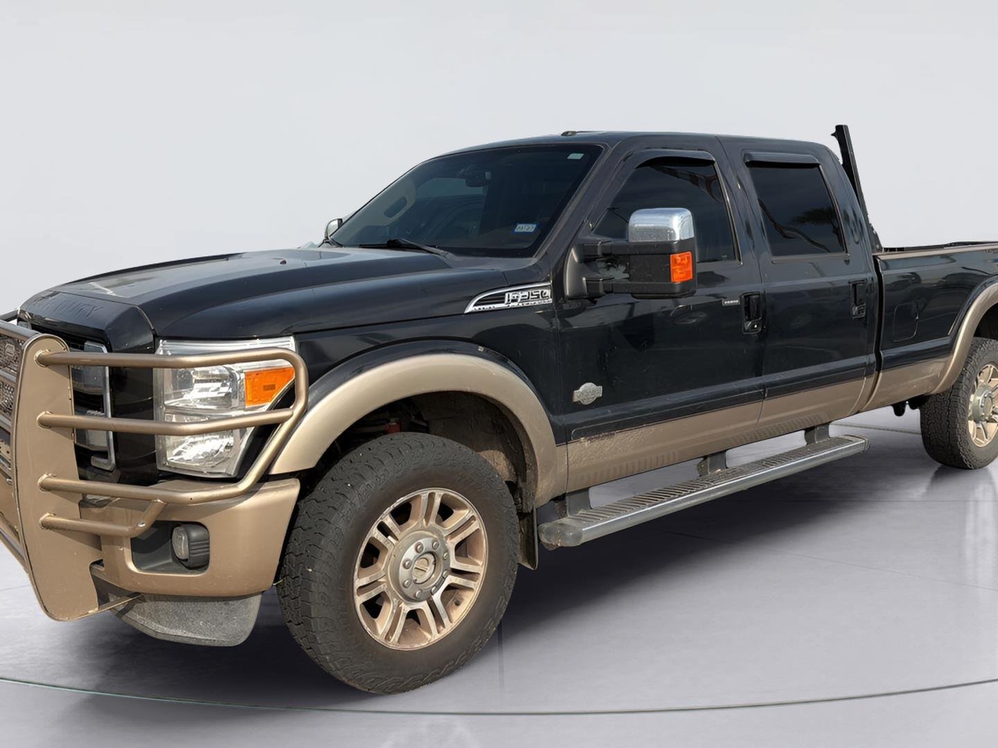 Used 2011 Tuxedo Black Metallic/Pale Adobe Metallic Ford King Ranch image 1