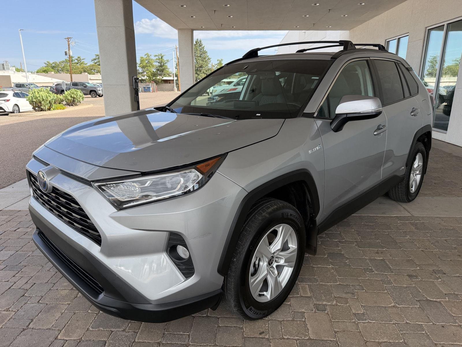 Used 2021 Silver Sky Metallic Toyota Hybrid XLE image 1