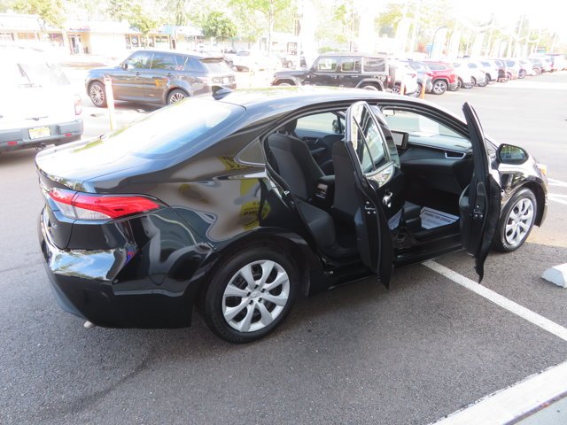 Used 2025 Midnight Black Metallic Toyota LE image 9