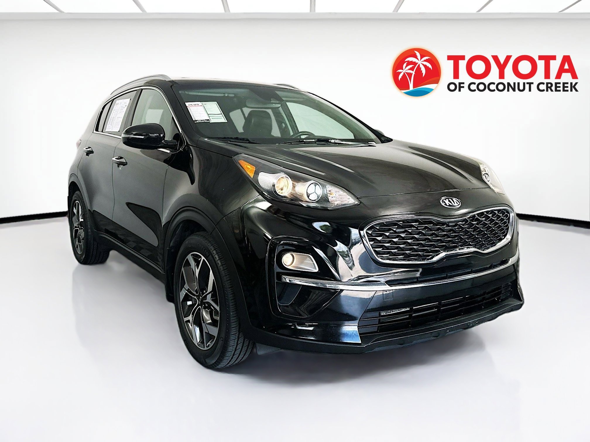 Used 2021 Black Cherry Kia EX image 1