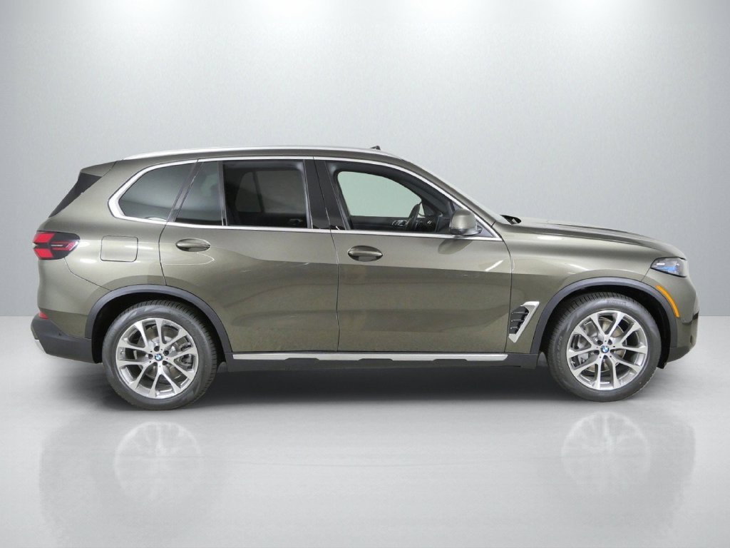 New 2026 Manhattan Green Metallic BMW xDrive50e image 8