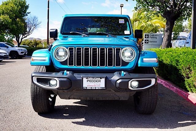 Used 2024 Blue Jeep Sahara 4xe image 4