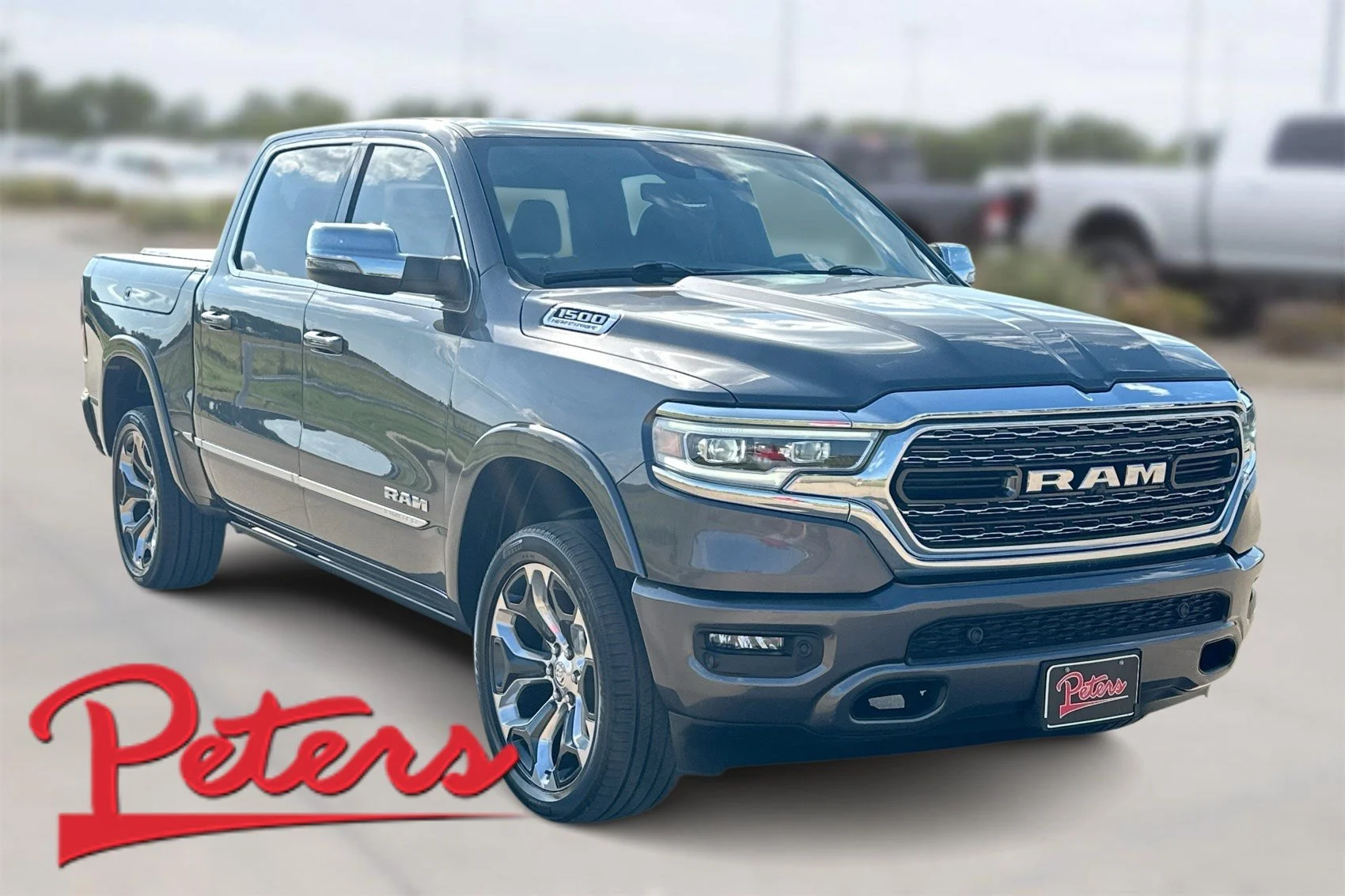 Used 2023 Granite Crystal Metallic Clearcoat Ram Limited image 1