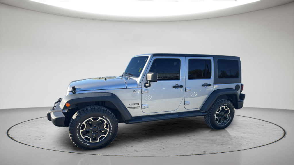 Used 2013 Silver Jeep Unlimited Sport image 14