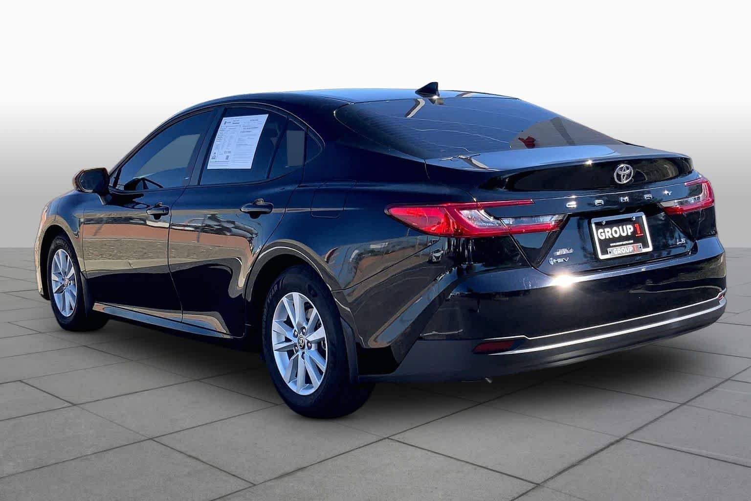 Used 2025 Midnight Black Metallic Toyota LE image 11