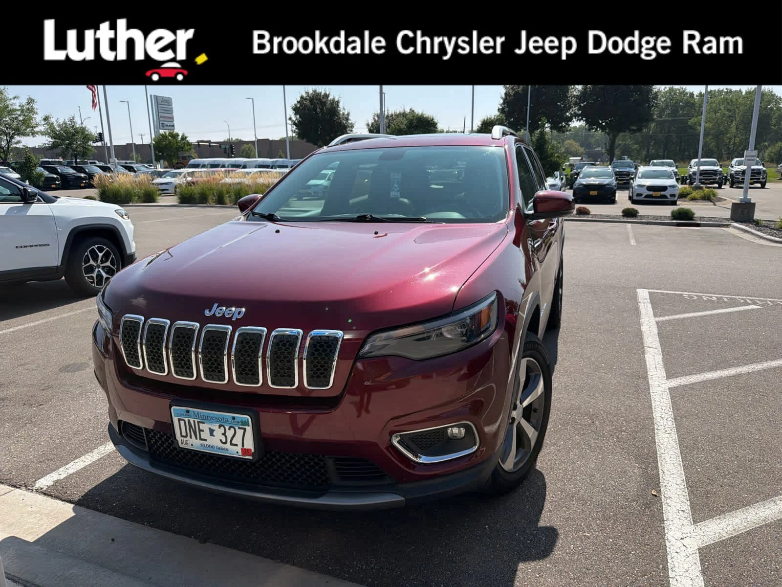 Used 2019 Velvet Red Pearlcoat Jeep Limited image 1