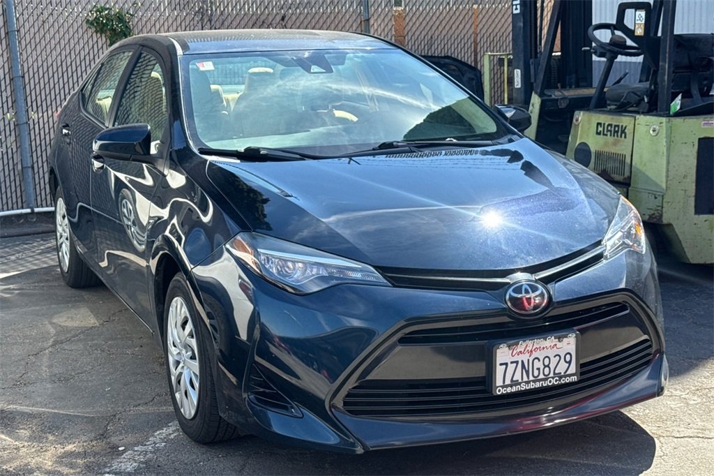 Used 2017 Toyota Corolla LE with VIN 5YFBURHE4HP710327 for sale in Fullerton, CA