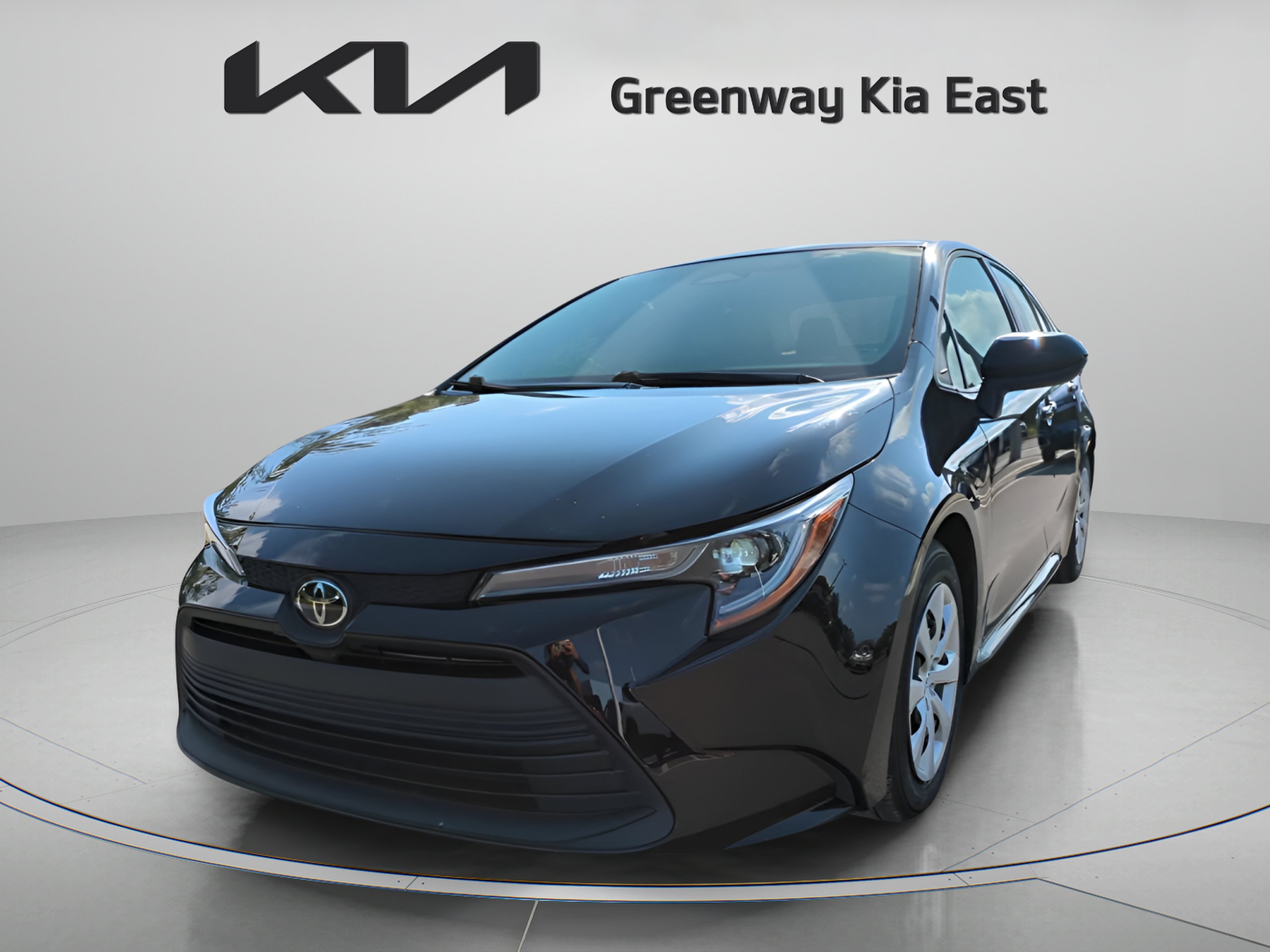 Used 2024 Midnight Black Metallic Toyota LE image 5